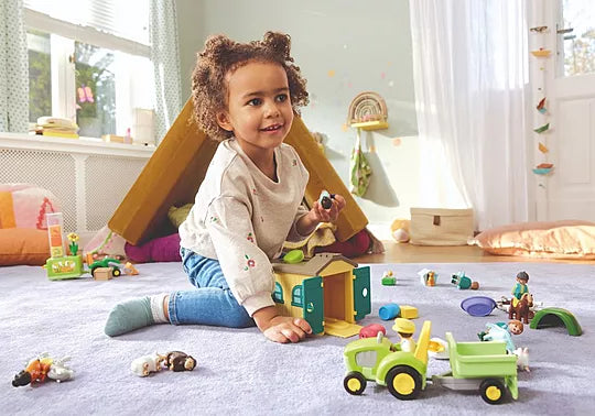 Playmobil - JUNIOR: Farm Adventure with Tractor, Trailer, and Animal Friends